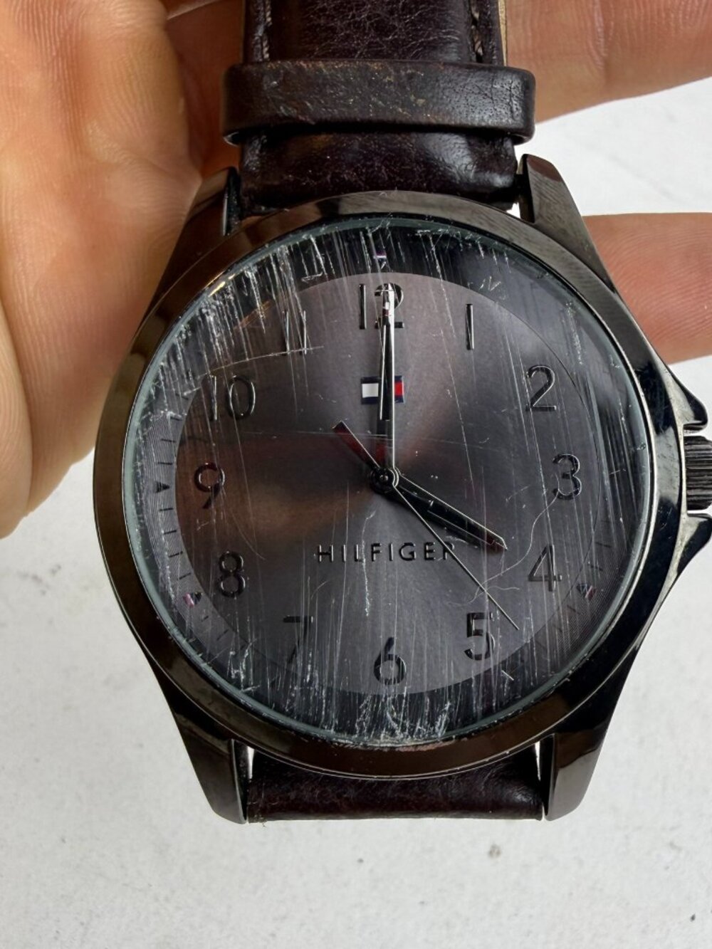 tommy hilfiger watch th.339.1.112.2473  brown leather band scratche need battery